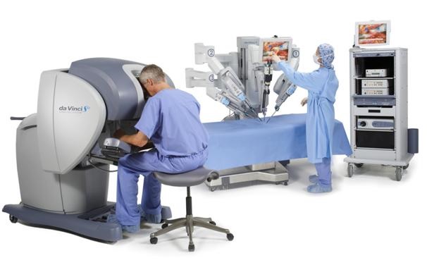 Doctors performing robotic-assisted surgery for urology procedures as a minimally invasive surgical option